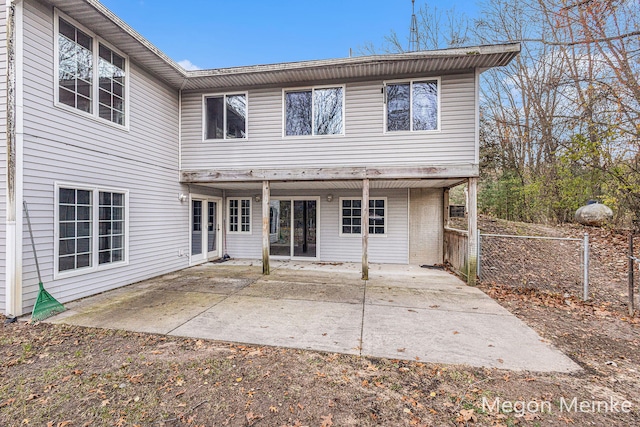 rear view of house featuring a patio