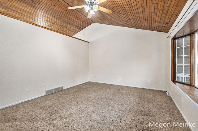 spare room featuring wooden ceiling, ceiling fan, carpet flooring, and lofted ceiling