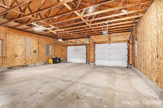 garage featuring a garage door opener