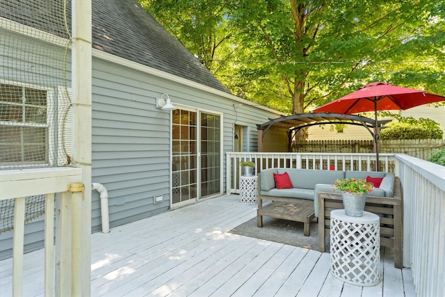 wooden deck with outdoor lounge area