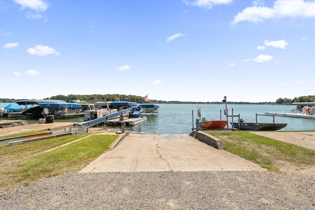 dock area with a water view