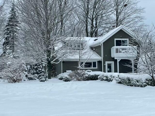 view of snow covered property