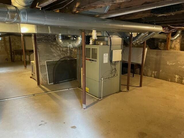 basement featuring heating unit