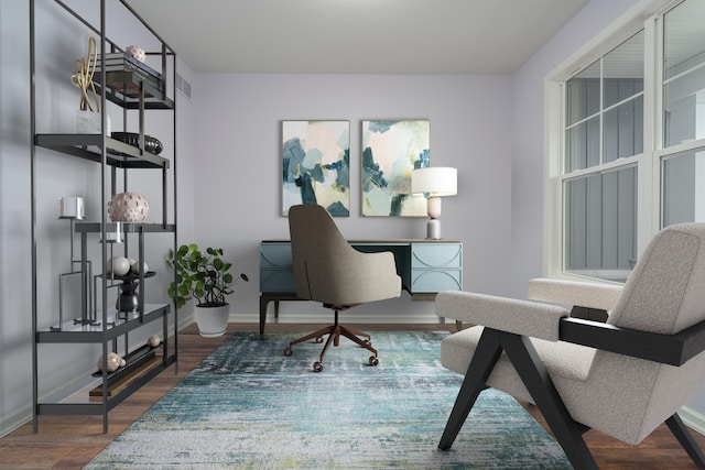 home office with dark wood-type flooring