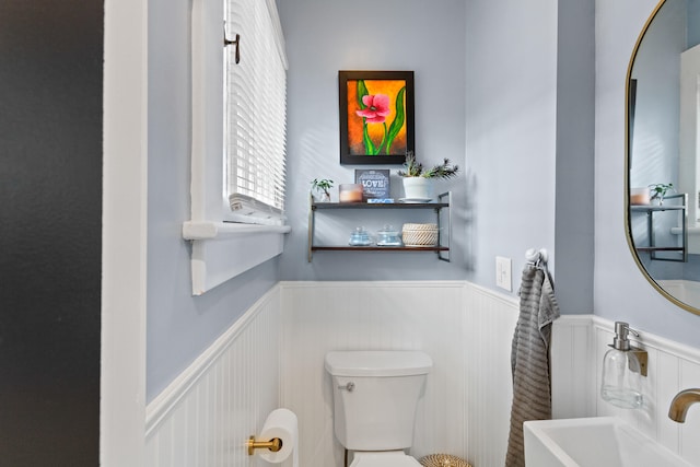 bathroom with toilet and sink