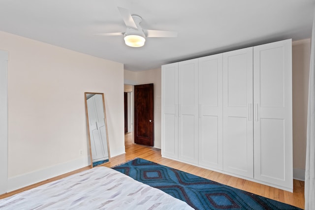 bedroom featuring ceiling fan and light hardwood / wood-style floors