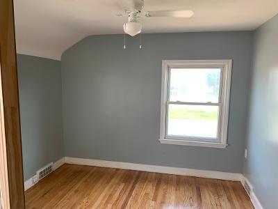 bonus room featuring light hardwood / wood-style flooring and vaulted ceiling