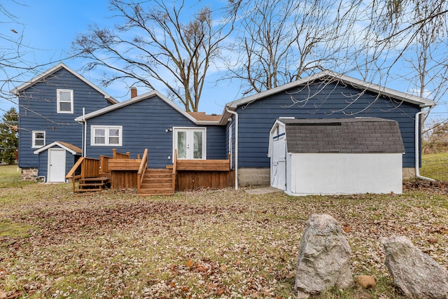 back of house featuring a deck and french doors