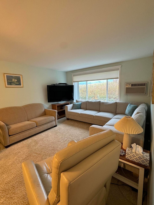 living room featuring an AC wall unit and carpet