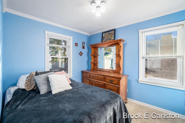 bedroom featuring ornamental molding and carpet floors