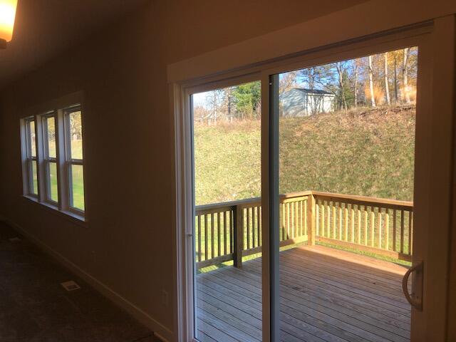 entryway featuring wood-type flooring