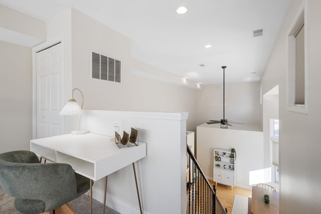 office area featuring hardwood / wood-style flooring and ceiling fan