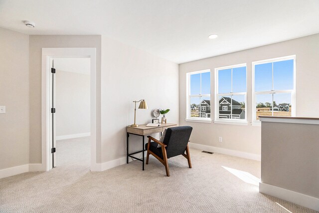 home office with light carpet