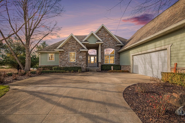 view of front of property with a garage