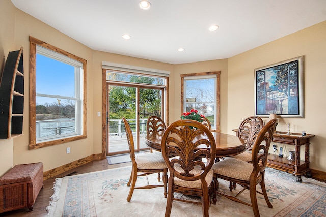 dining area with light wood-type flooring