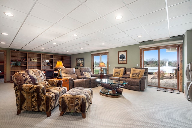 carpeted living room featuring a healthy amount of sunlight