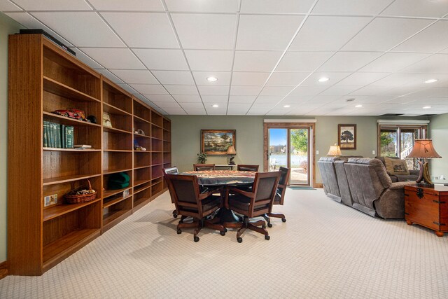 interior space featuring a drop ceiling