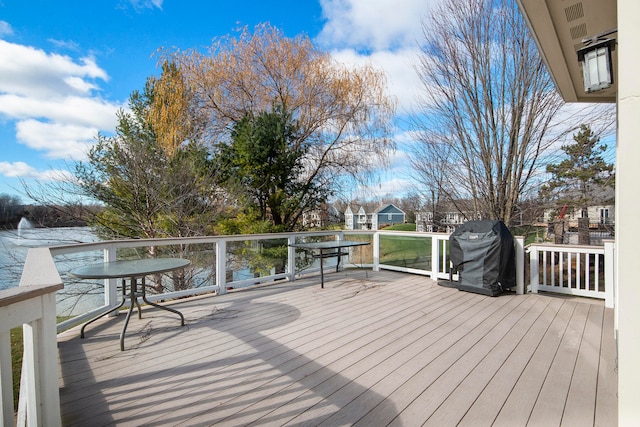 wooden deck with grilling area