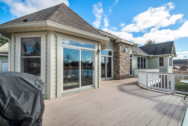 wooden deck with area for grilling