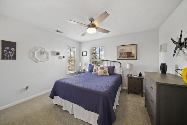 bedroom featuring light carpet and ceiling fan