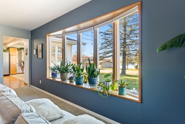 interior space with white fridge and carpet floors