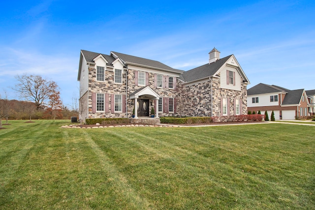 view of front of house featuring a front lawn