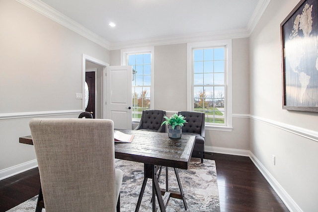 dining space with dark hardwood / wood-style floors and ornamental molding