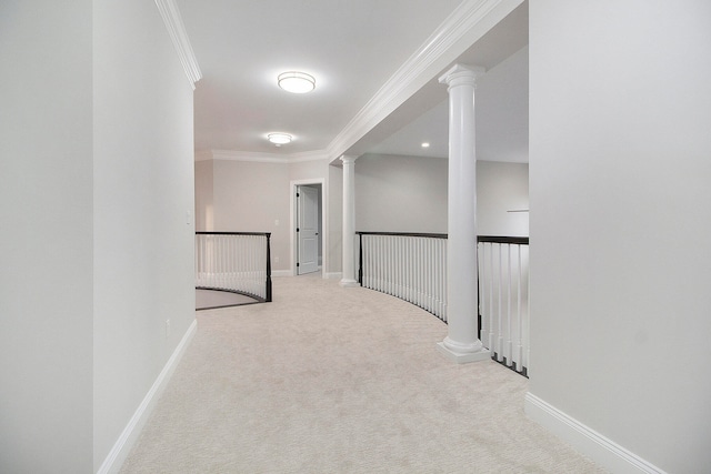 hall with crown molding and light colored carpet