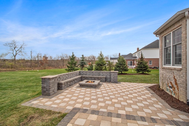 view of patio featuring a fire pit