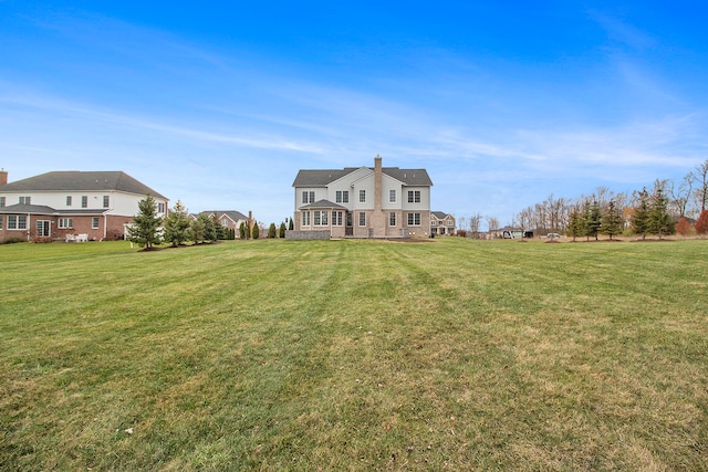 exterior space with a lawn