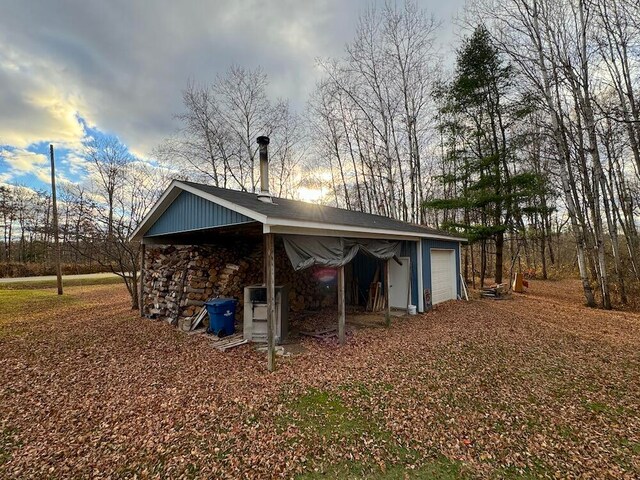 view of outdoor structure featuring a garage