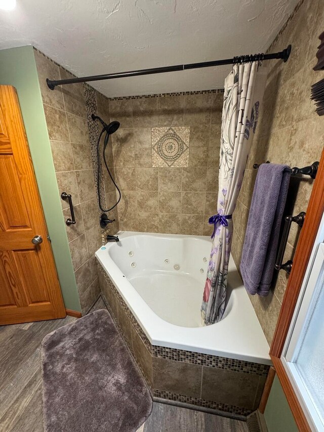 bathroom with shower / tub combo with curtain