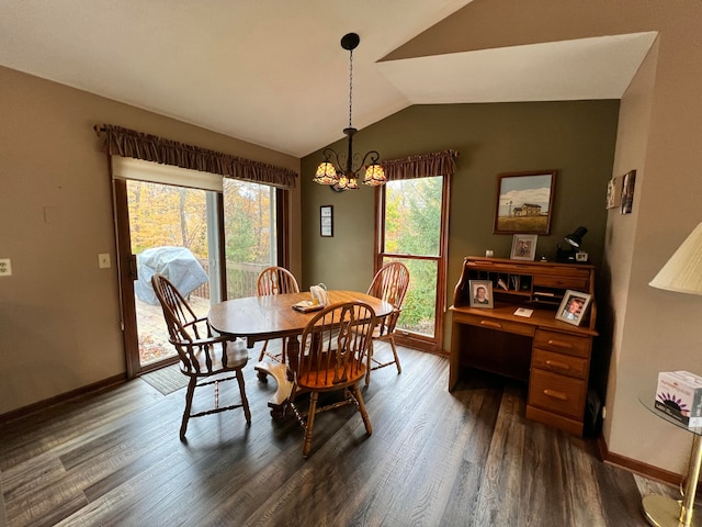 dining room with a notable chandelier, dark hardwood / wood-style floors, and lofted ceiling