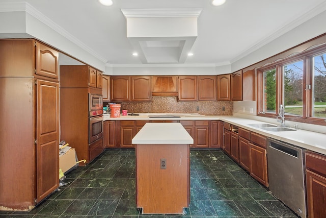 4489 Cranbrook Trl, Orchard Lake, MI 48323 - kitchen featuring light countertops, premium range hood, a kitchen island, appliances with stainless steel finishes, and a sink