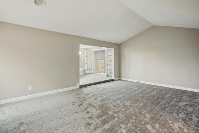 4489 Cranbrook Trl, Orchard Lake, MI 48323 - carpeted spare room featuring baseboards and vaulted ceiling