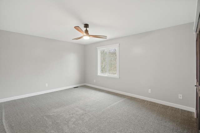 4489 Cranbrook Trl, Orchard Lake, MI 48323 - spare room featuring ceiling fan, baseboards, carpet flooring, and visible vents