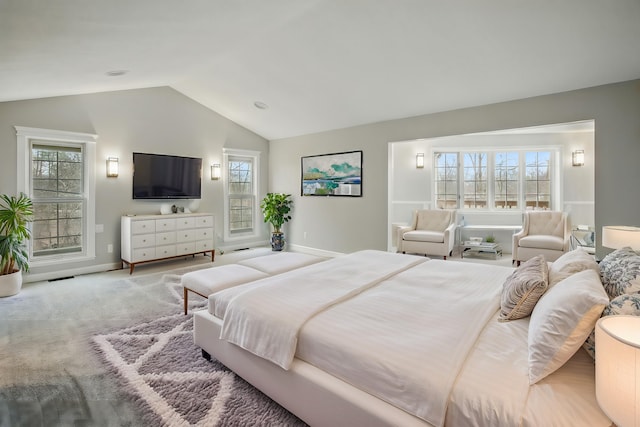 4489 Cranbrook Trl, Orchard Lake, MI 48323 - carpeted bedroom featuring visible vents, baseboards, and vaulted ceiling
