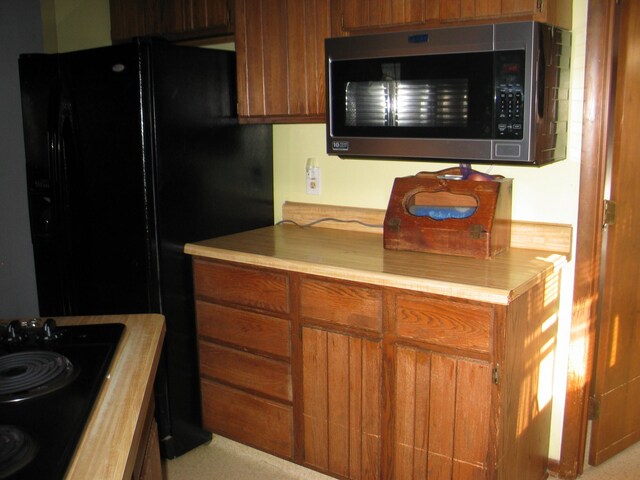 kitchen with black appliances