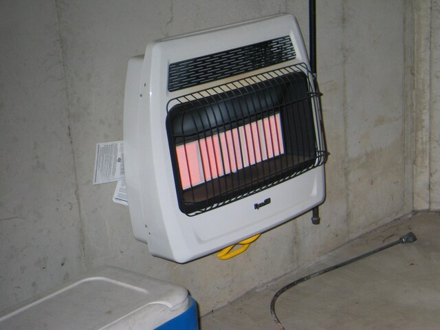 interior details with concrete floors and heating unit