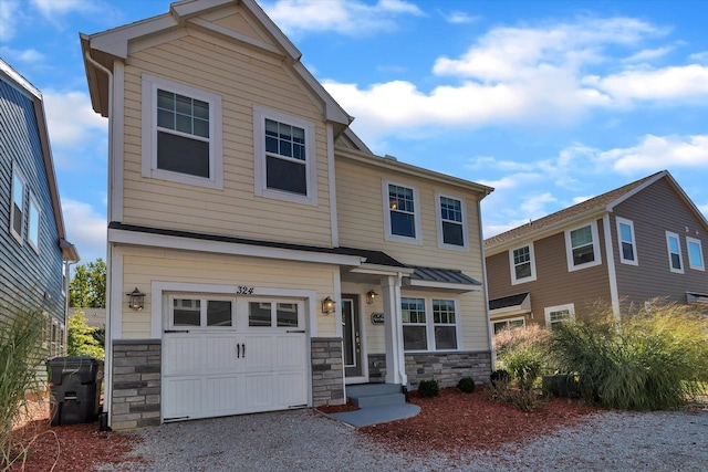 view of front of home with a garage