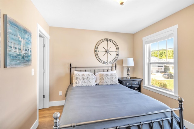 bedroom with wood-type flooring