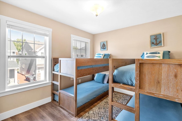 bedroom featuring wood-type flooring