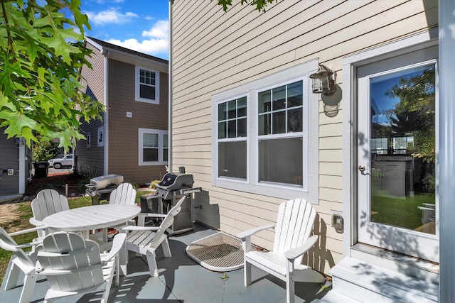 view of patio with a grill