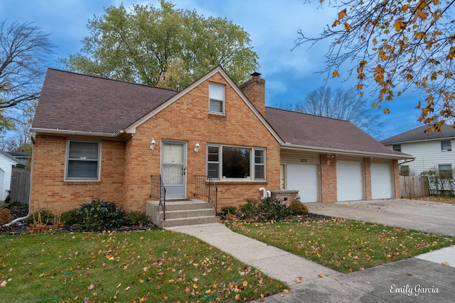 view of front of house with a front lawn and a garage