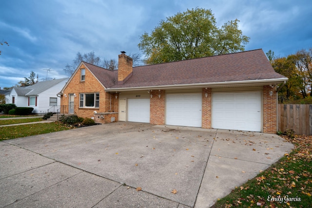 single story home with a garage