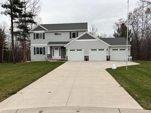 view of front facade with a front lawn and a garage