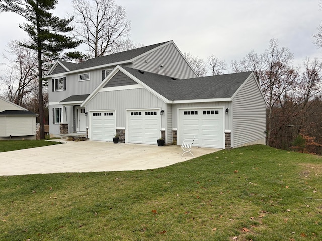 exterior space featuring a front yard and a garage