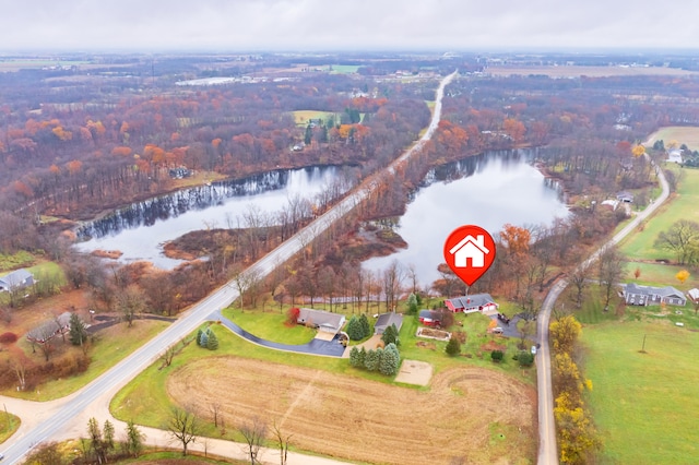 drone / aerial view featuring a water view