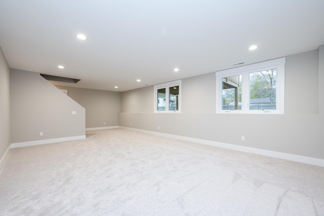 basement with light carpet