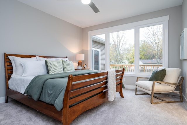 bedroom with ceiling fan and carpet floors